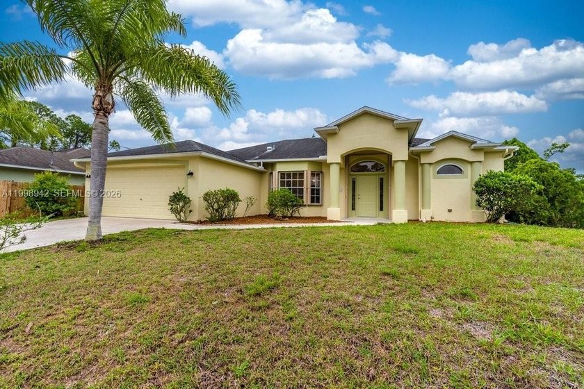Situated on an oversized corner lot in a tranquil neighborhood - Beach Home for sale in Lehigh Acres, Florida on Beachhouse.com
