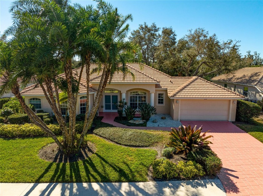 Step into a breath of pure delight with this Calusa Lakes Golf - Beach Home for sale in Nokomis, Florida on Beachhouse.com