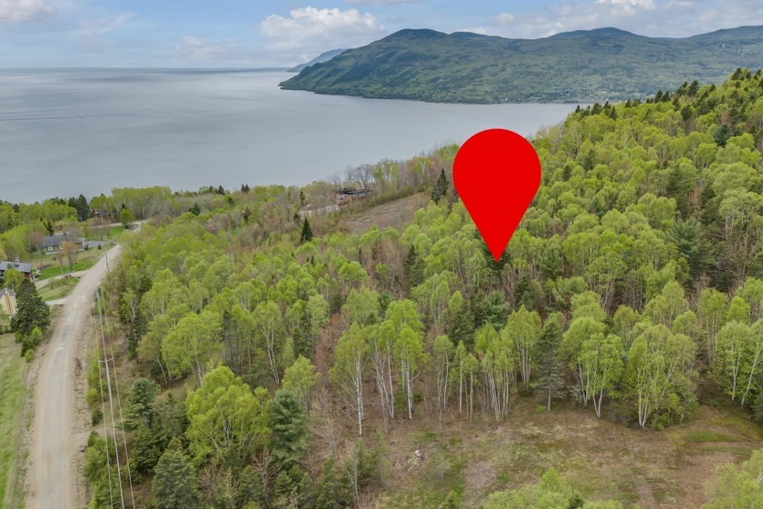 CAP-AU-CORBEAUX -- Rare terrain boise de 67 597 pi2 situe dans - Beach Lot for sale in Baie-Saint-Paul, QC on Beachhouse.com