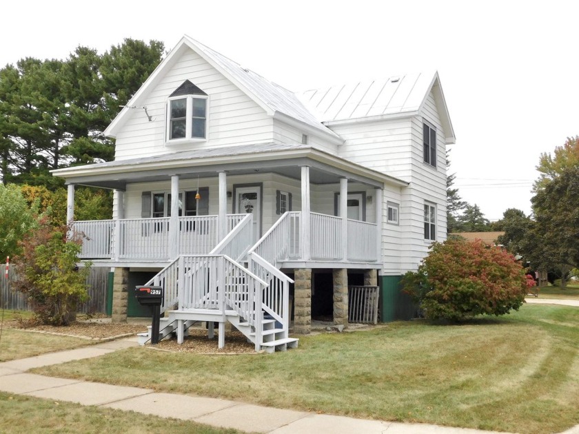 Sprawling turn of the century home located across from the golf - Beach Home for sale in Oconto, Wisconsin on Beachhouse.com