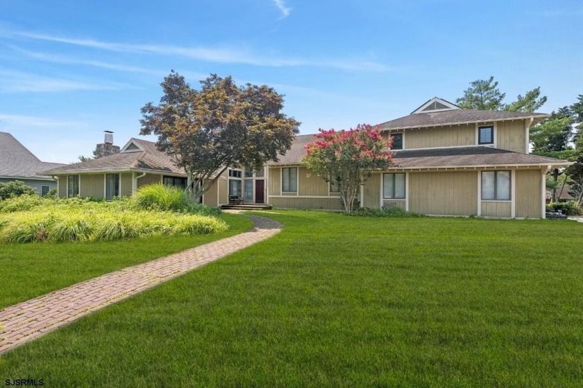 Welcome to this 5600+ square foot contemporary split level 6 - Beach Home for sale in Absecon, New Jersey on Beachhouse.com