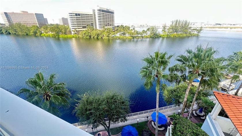 BEAUTIFUL APARTMENT REMODELED CORNER UNIT AT BLUE LAGOON - Beach Condo for sale in Miami, Florida on Beachhouse.com