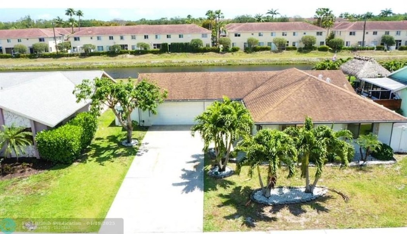 Welcome to 51 Vista Del Rio -- a charming canal-front home in - Beach Home for sale in Boynton Beach, Florida on Beachhouse.com