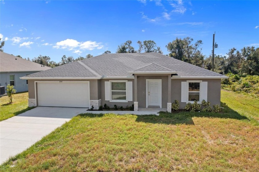 NEW CONSTRUCTION! MOVE-IN-READY! GREAT INVESTMENT OPPORTUNITY OR - Beach Home for sale in Port Charlotte, Florida on Beachhouse.com