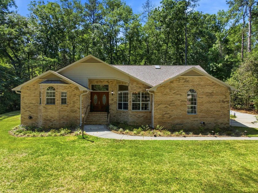 Nestled in Lakeshore on 1.2 acres, this property offers a - Beach Home for sale in Tallahassee, Florida on Beachhouse.com