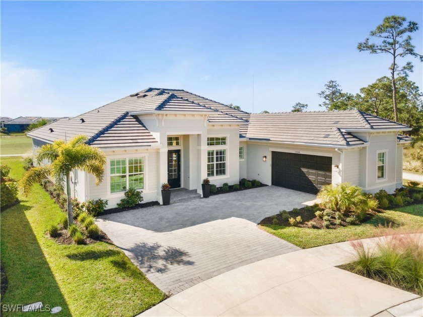 Welcome to this exceptional Westwind model home, located within - Beach Home for sale in Punta Gorda, Florida on Beachhouse.com