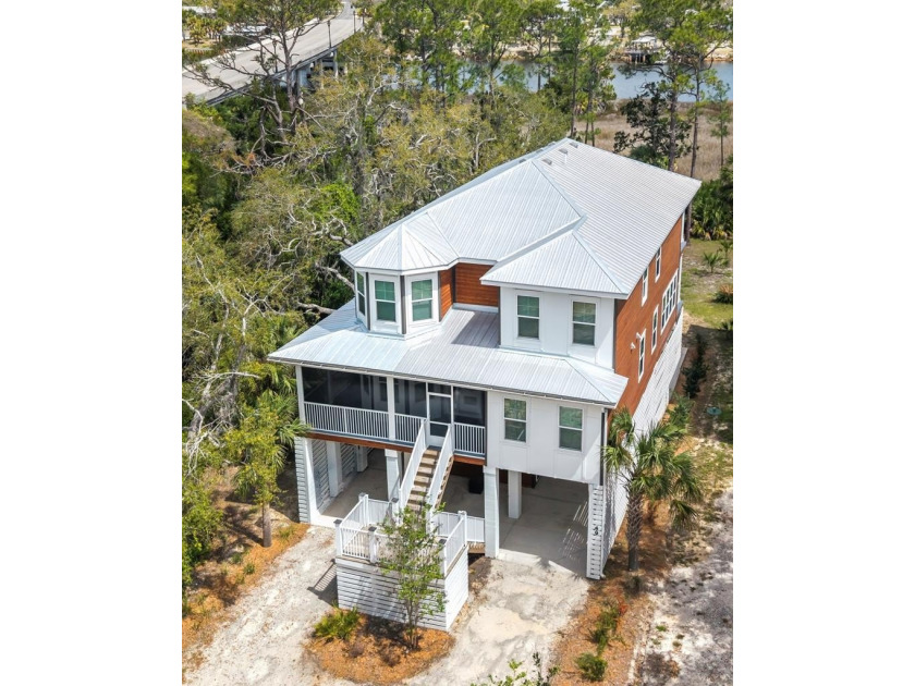 LUXURY RIVERFRONT INCOME PRODUCER IN GATED COMMUNITY!  Welcome - Beach Home for sale in Steinhatchee, Florida on Beachhouse.com