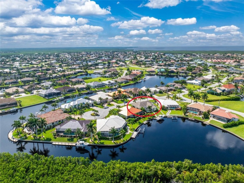 STUNNING SUNSETS. QUICK HARBOR ACCESS, 16K BOAT LIFT - Beach Home for sale in Punta Gorda, Florida on Beachhouse.com