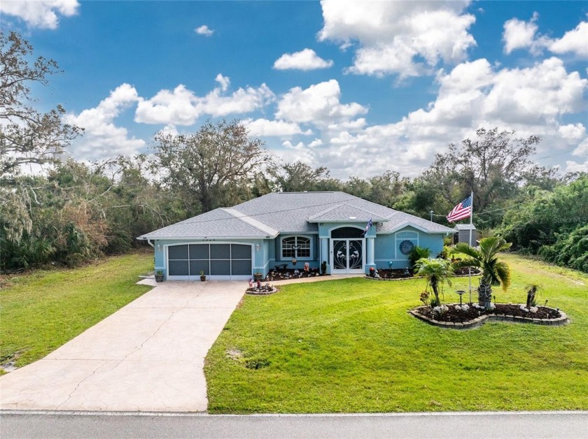 This custom-built, 4-bedroom, solar, waterfront home with a pool - Beach Home for sale in Port Charlotte, Florida on Beachhouse.com