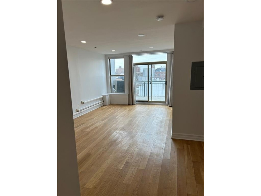 Welcome to this charming 3-bedroom, 2-bathroom Penthouse - Beach Condo for sale in Brooklyn, New York on Beachhouse.com
