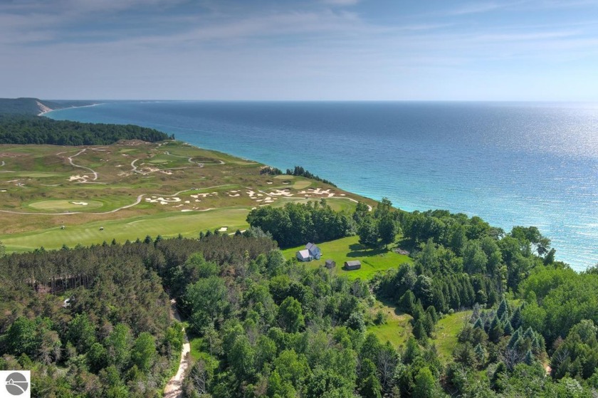 This iconic gray cottage on the bluffs of Lake Michigan and next - Beach Home for sale in Arcadia, Michigan on Beachhouse.com