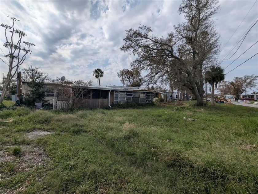 Investor Alert! This is a PRIME LOCATION with almost a 1/2 acre - Beach Home for sale in Port Charlotte, Florida on Beachhouse.com