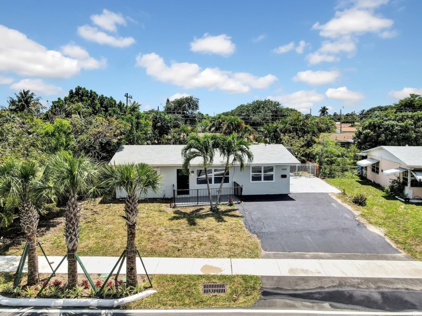 Discover the charm of this renovated home in a no-HOA - Beach Home for sale in Pompano Beach, Florida on Beachhouse.com