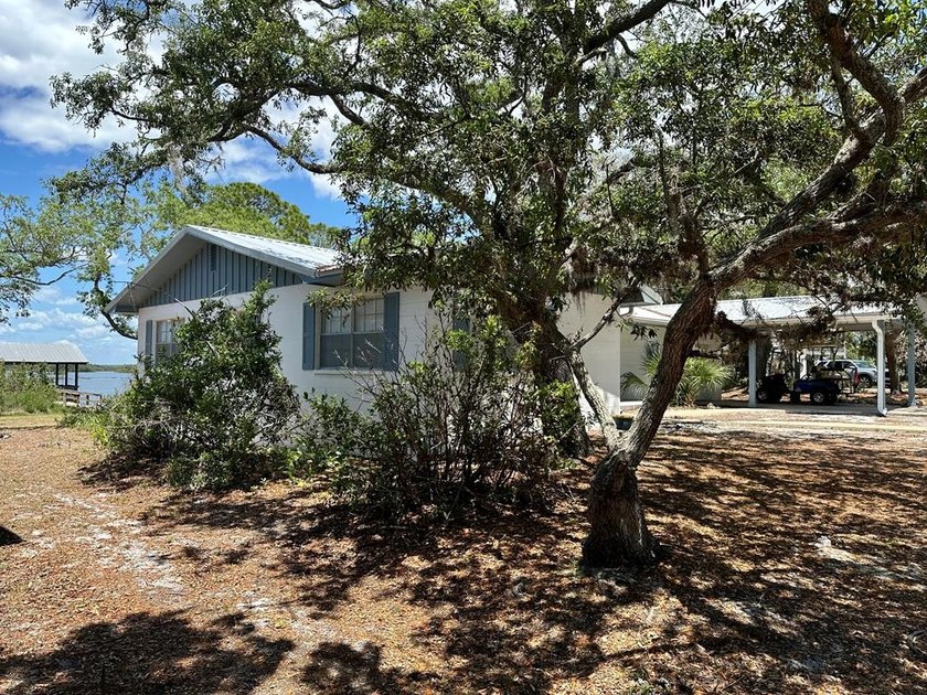 Take a look at this large three-bedroom, two-bath water front - Beach Home for sale in Cedar Key, Florida on Beachhouse.com