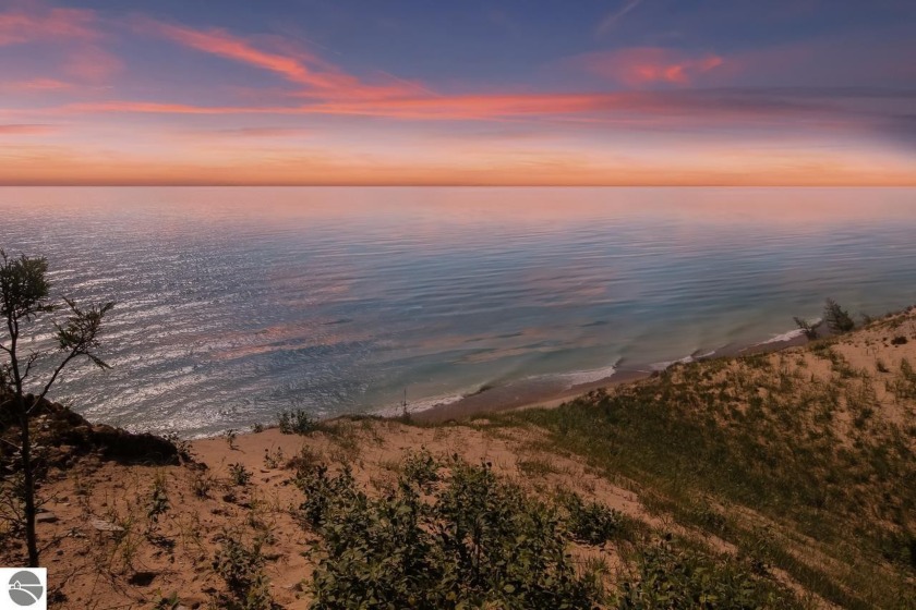 This iconic gray cottage on the bluffs of Lake Michigan and next - Beach Acreage for sale in Arcadia, Michigan on Beachhouse.com