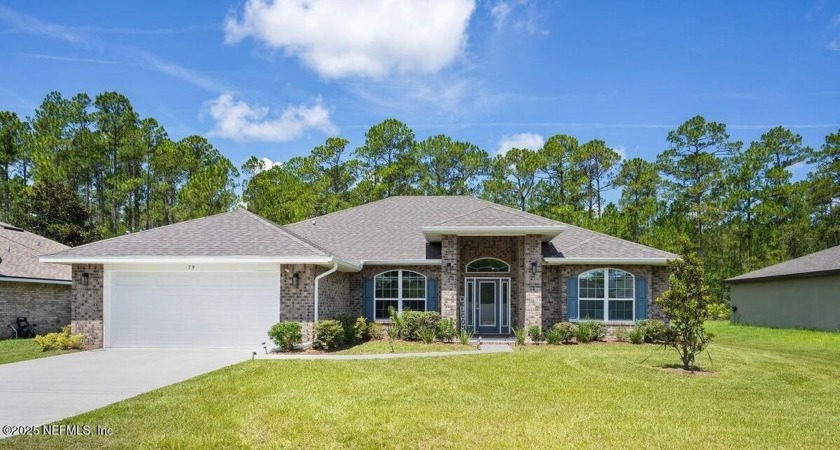 Welcome home to 79 Reidsville Drive - a beautifully maintained - Beach Home for sale in Palm Coast, Florida on Beachhouse.com