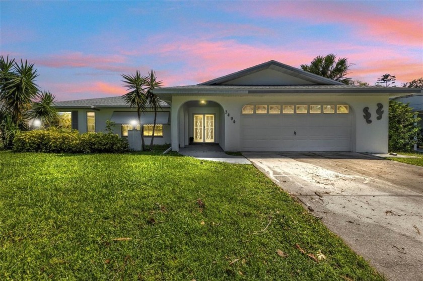 Welcome to this stunning 3-bedroom, 2-bathroom pool home with a - Beach Home for sale in Port Charlotte, Florida on Beachhouse.com