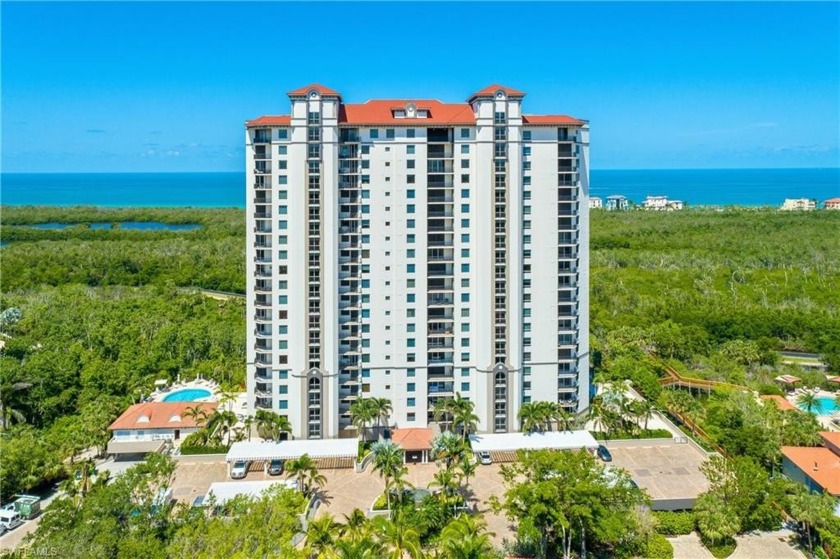 Spacious and gracious 3 bedroom, 3 full bath residence with - Beach Home for sale in Naples, Florida on Beachhouse.com