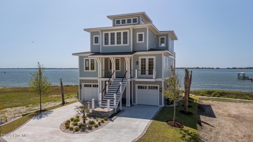 Discover coastal elegance in this stunning 5-bedroom, 5.5 - Beach Home for sale in Morehead City, North Carolina on Beachhouse.com