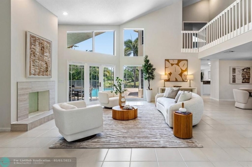 Serene lake views, sunlit living spaces, and a private backyard - Beach Home for sale in Delray Beach, Florida on Beachhouse.com