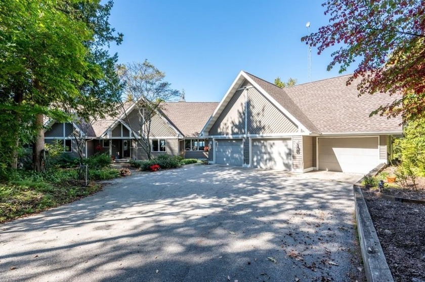 This 4-bedroom, 2.5-bathroom beauty that truly redefines - Beach Home for sale in Ellison Bay, Wisconsin on Beachhouse.com