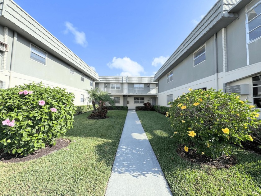 Enjoy comfort and convenience in this updated 2-bedroom, 2-bath - Beach Condo for sale in Delray Beach, Florida on Beachhouse.com