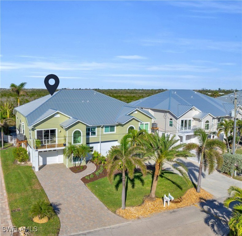 Welcome to your dream home, where water views surround you at - Beach Home for sale in Fort Myers Beach, Florida on Beachhouse.com