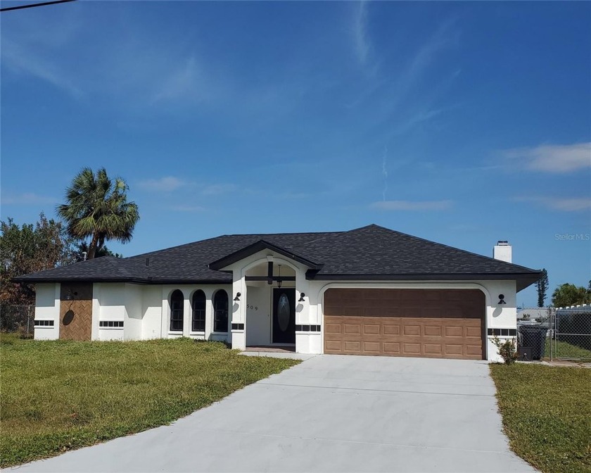 This Gorgeous 3 Bedroom 2 Bath 2 car Garage is a must see - Beach Home for sale in Port Charlotte, Florida on Beachhouse.com