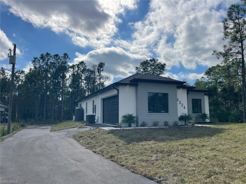 NEW CONSTRUCTION 2024!!!!4 BEDROOMS AND TWO BATHS,1746 SQF UNDER - Beach Home for sale in Naples, Florida on Beachhouse.com