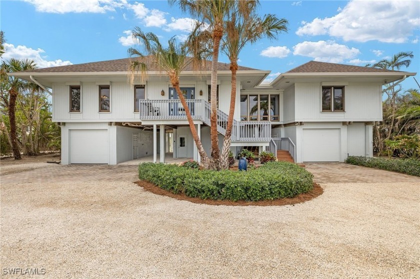 Experience coastal living at its finest at 5045 Joewood Dr - Beach Home for sale in Sanibel, Florida on Beachhouse.com