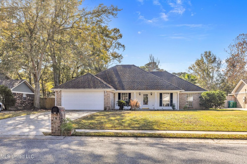 Embrace the coastal lifestyle in this charming 3 bedroom, 2 bath - Beach Home for sale in Ocean Springs, Mississippi on Beachhouse.com