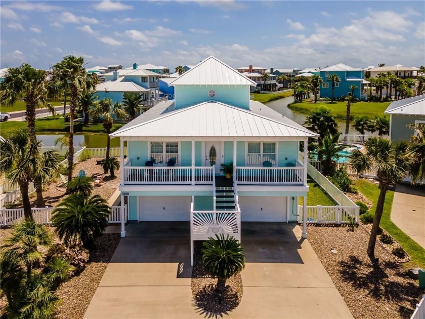 Beautiful 3 story beach home on a nature pond within the sought - Beach Home for sale in Port Aransas, Texas on Beachhouse.com