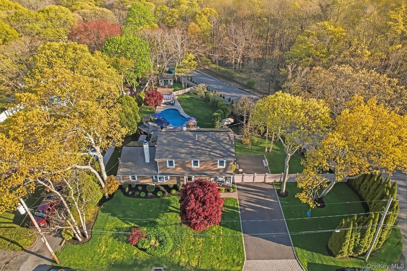 Feel like you're on vacation every day in this private Mastic - Beach Home for sale in Mastic, New York on Beachhouse.com