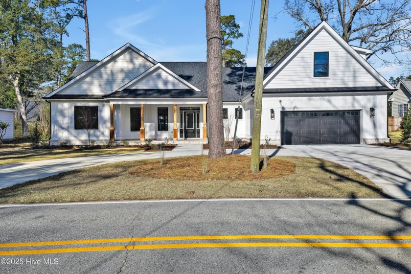 Rare opportunity to purchase this nearly new home nestled in the - Beach Home for sale in Wilmington, North Carolina on Beachhouse.com