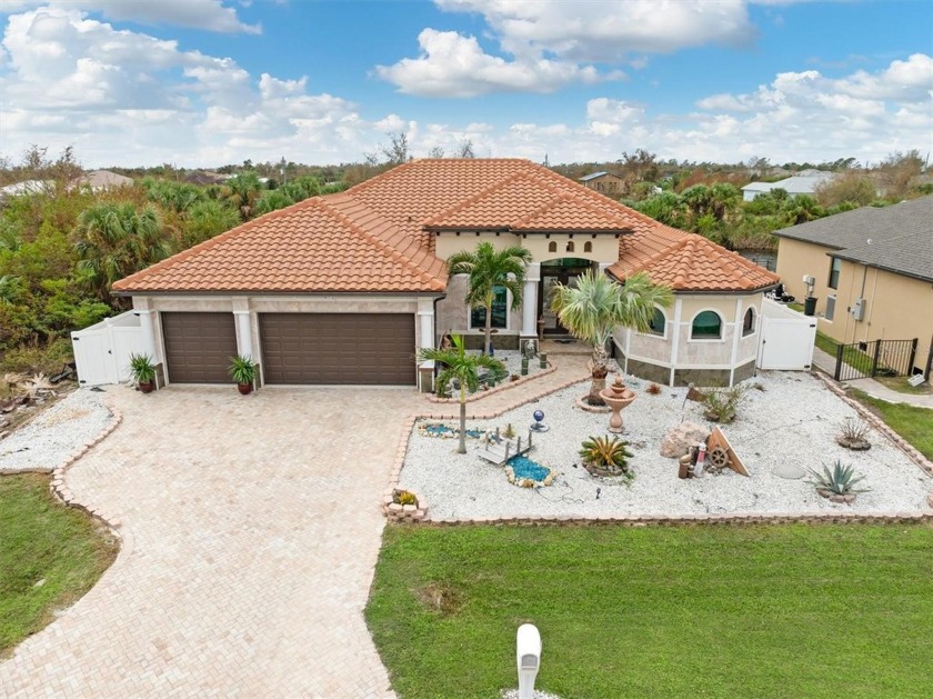 Discover the epitome of luxury living at 13878 Allamanda Cir - Beach Home for sale in Port Charlotte, Florida on Beachhouse.com