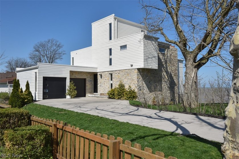 Set directly on the shores of Lake Erie, this extraordinary - Beach Condo for sale in Sheffield Lake, Ohio on Beachhouse.com