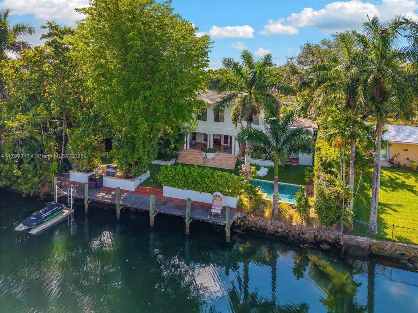 This stunningly remodeled home features 100' of water frontage - Beach Home for sale in Coral Gables, Florida on Beachhouse.com