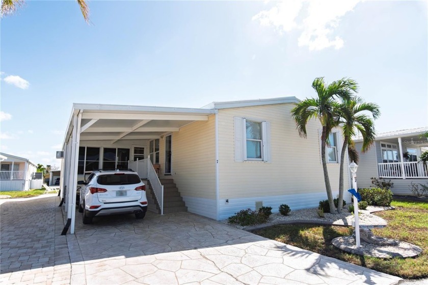 Located in the desirable 55+ community of Windmill Village, this - Beach Home for sale in Punta Gorda, Florida on Beachhouse.com