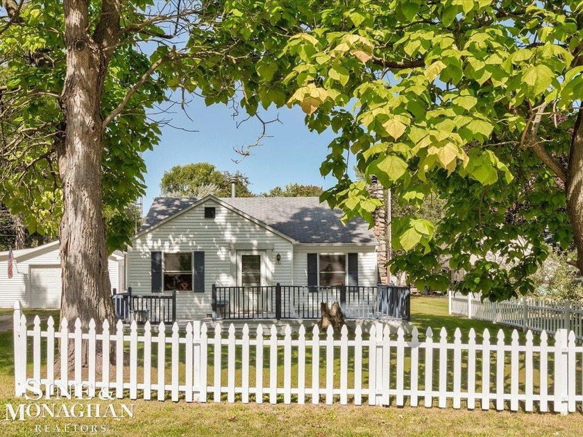 This charming 3-bedroom, 2-bathroom home is nestled in a quiet - Beach Home for sale in Lexington, Michigan on Beachhouse.com