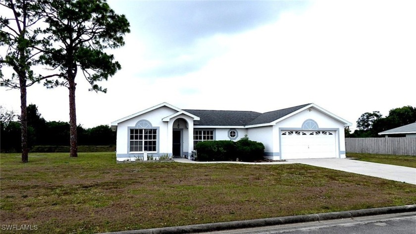 This wonderful home is situated on a oversized lot that backs to - Beach Home for sale in Lehigh Acres, Florida on Beachhouse.com