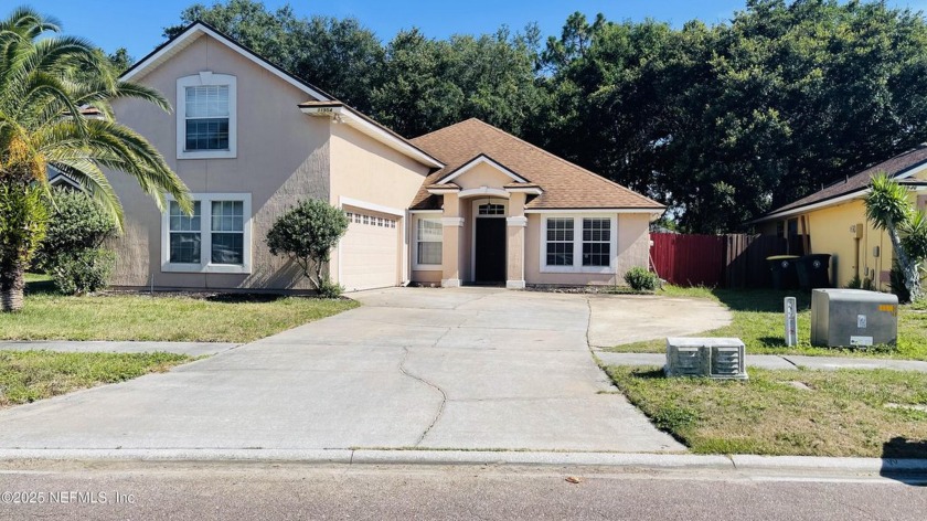 High ROI Opportunity Awaits! This spacious 4-bed, 3-bath home is - Beach Home for sale in Jacksonville, Florida on Beachhouse.com