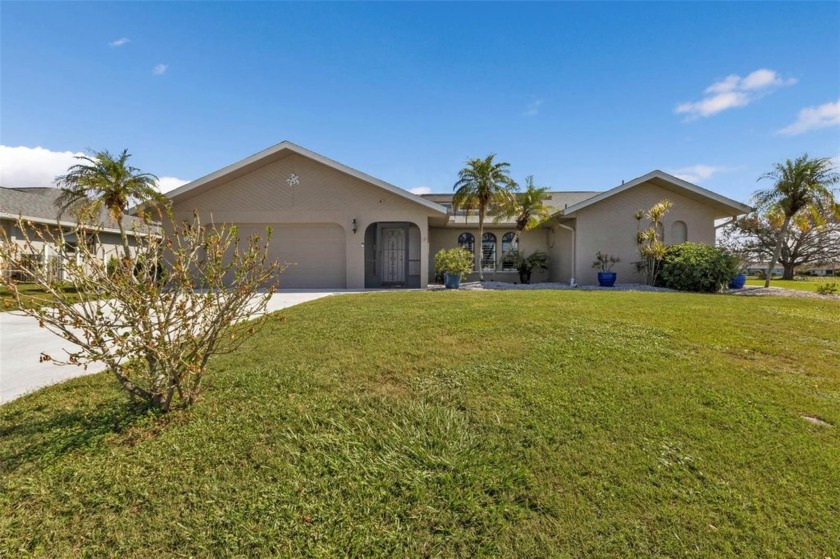 Nestled on a Cul de sac in desired Deep Creek. This Stunning 3/2 - Beach Home for sale in Punta Gorda, Florida on Beachhouse.com