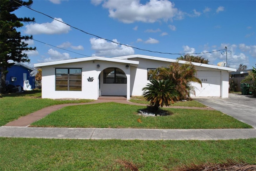 Fantastic location!  Canal front property with access to - Beach Home for sale in Port Charlotte, Florida on Beachhouse.com