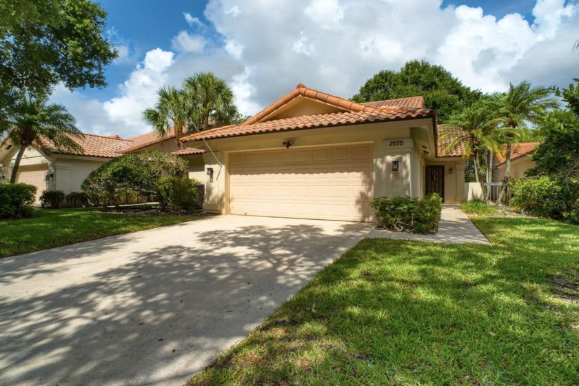 Enjoy the ideal Florida lifestyle in this built-solid DiVosta - Beach Home for sale in West Palm Beach, Florida on Beachhouse.com