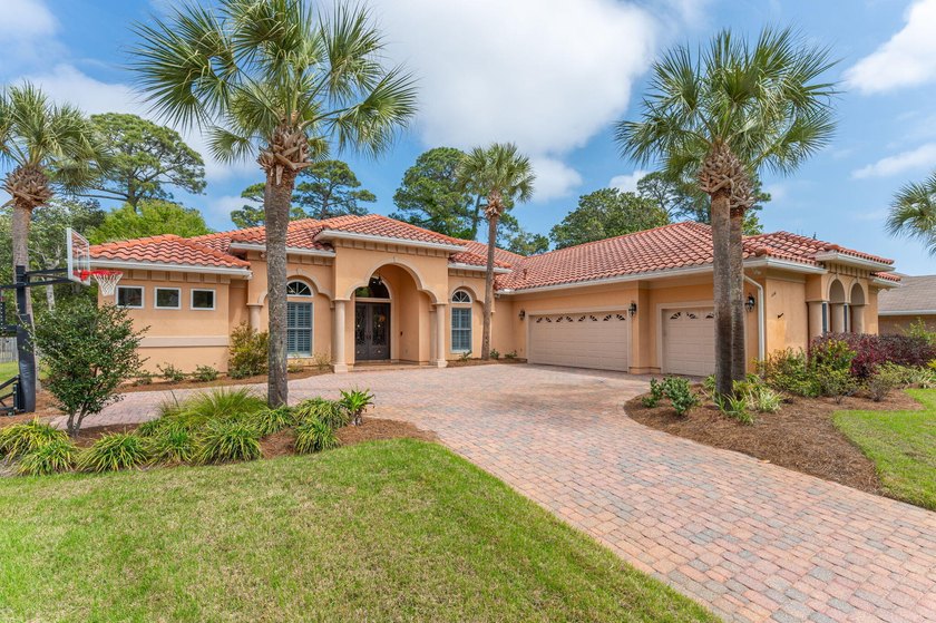 Situated on nearly half an acre backing to the 2nd fairway of - Beach Home for sale in Niceville, Florida on Beachhouse.com