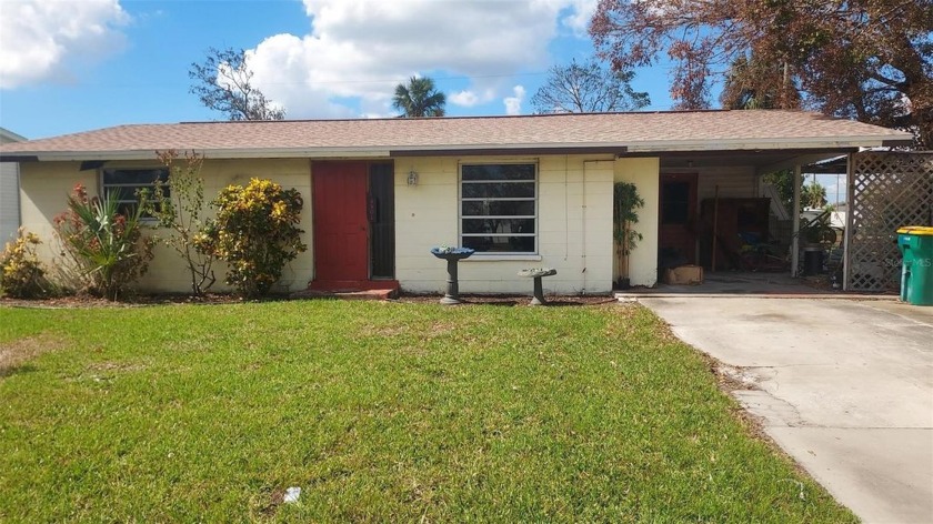 INVESTOR ALERT.  This 2 bedroom, 1 bath home suffered flooding - Beach Home for sale in Punta Gorda, Florida on Beachhouse.com