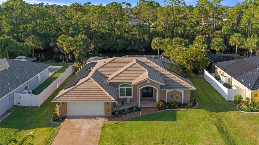 Welcome to your dream home nestled on a serene freshwater canal! - Beach Home for sale in North Port, Florida on Beachhouse.com