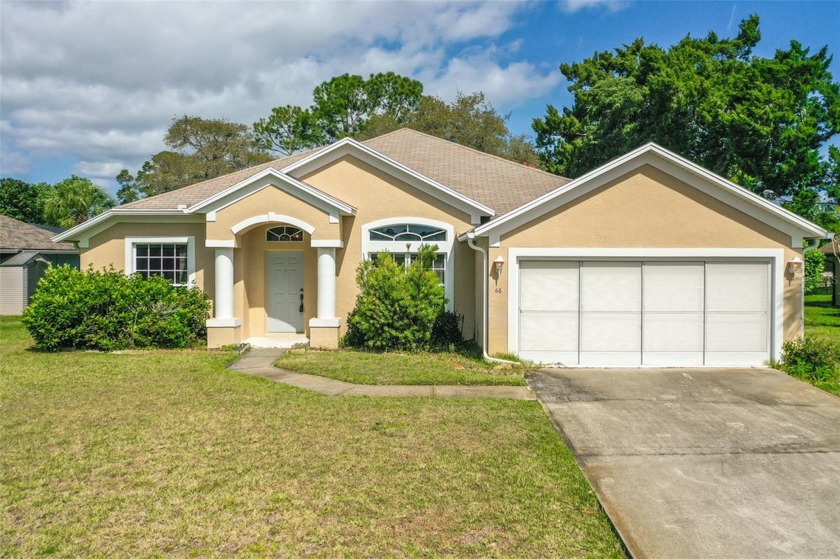 Bring your vision to this charming home in the heart of Palm - Beach Home for sale in Palm Coast, Florida on Beachhouse.com