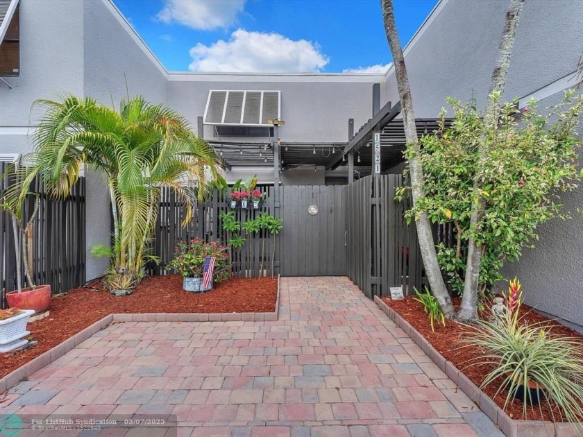 Waterfront Paradise Awaits! Discover this stunning 3-bed, 2-bath - Beach Townhome/Townhouse for sale in Pembroke Pines, Florida on Beachhouse.com