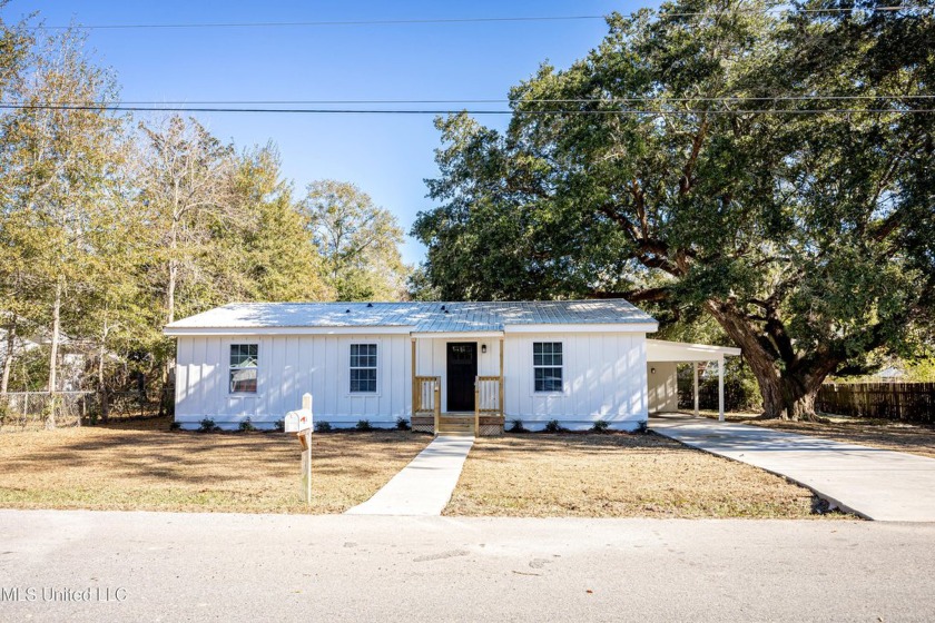 This beautifully updated 3-bedroom, 3-bath home has everything - Beach Home for sale in Ocean Springs, Mississippi on Beachhouse.com